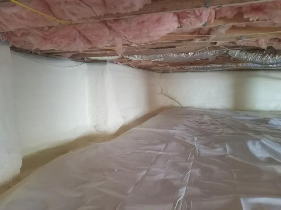 Crawl space encapsulation with closed-cell spray foam for Commercial Roof Restoration in Kansas City